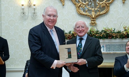Robert Kearns accepting award from President Michael D Higgins