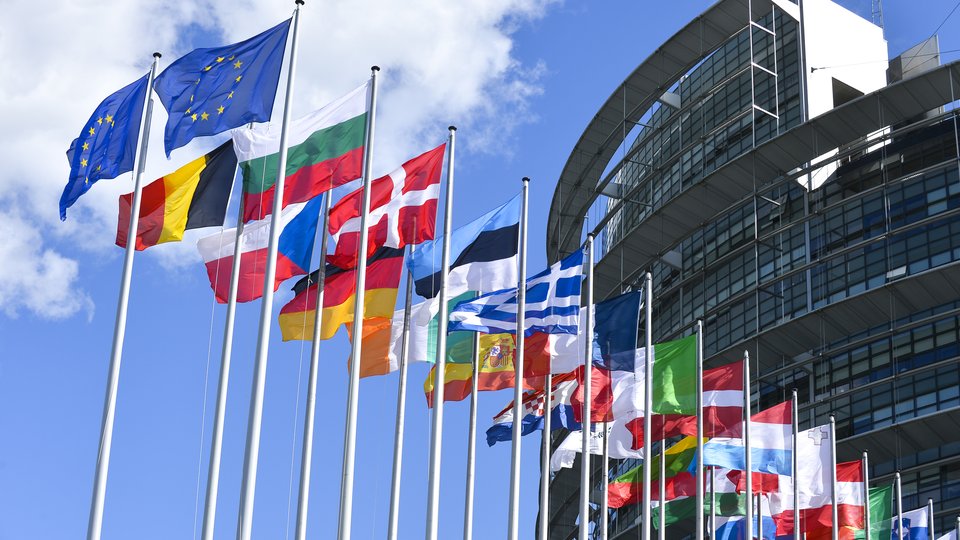 Flags of EU member states flying outside EU buildings