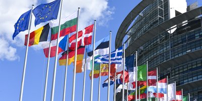 Flags of EU member states flying outside EU buildings