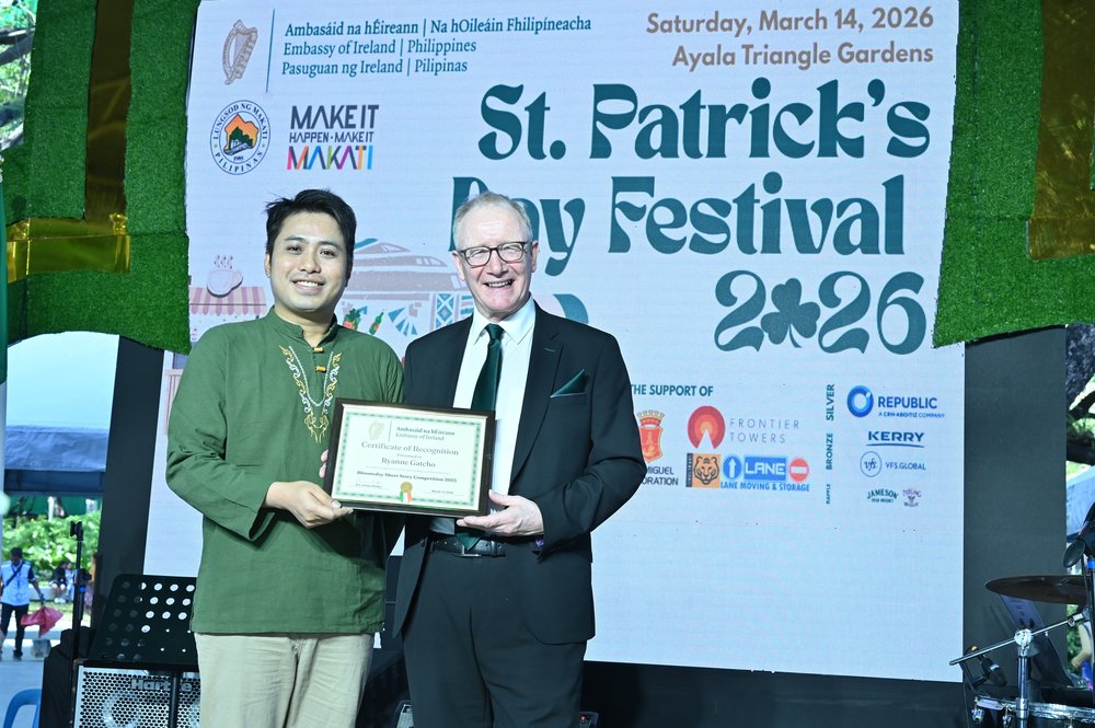 Man being presented an award