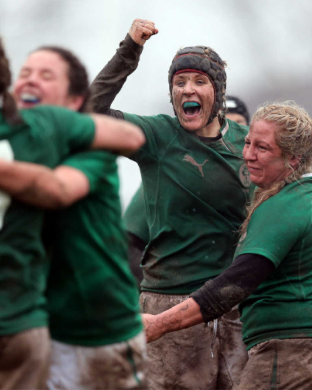An Irish player celebrating on the pitch