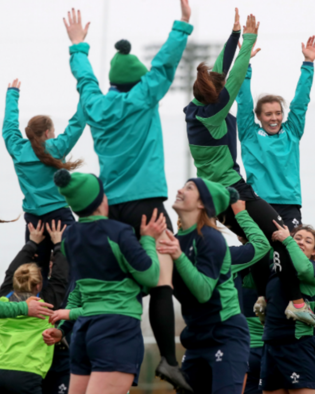 Players practicing lifts in training