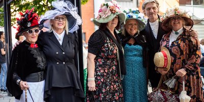 Three people in Bloomsday costume