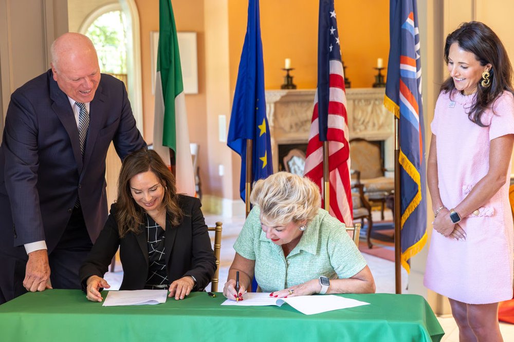 Ambassador Byrne Nason and Rosie Rios sign MoU