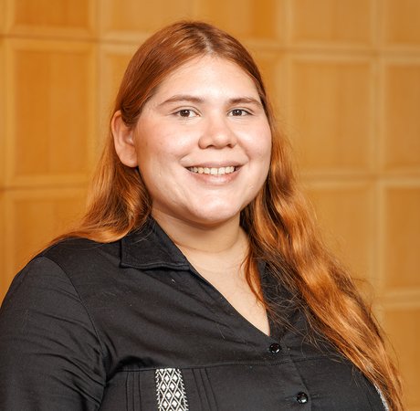Woman smiling wearing a black shirt