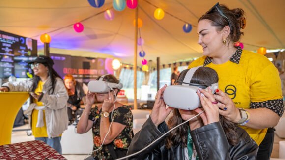 Young people wearing headsets at All Together Now Festival