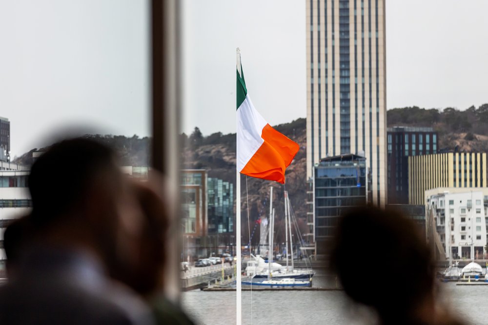 The Irish flag flies over the harbour in Gothenburg.