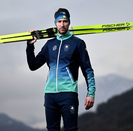 Thomas Maloney Westgård posing with his skis in Italy