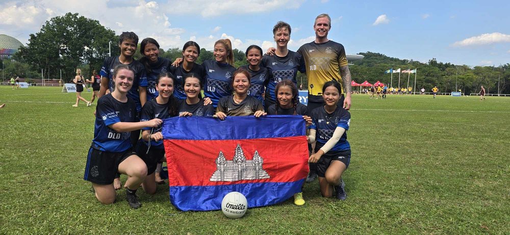 The Cairde Khmer team with the Cambodian flag