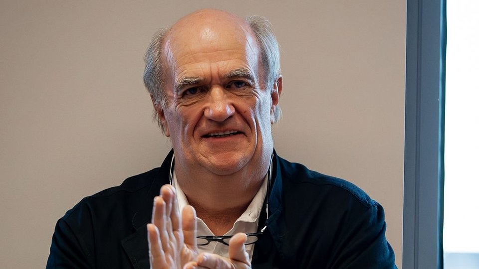 Colm Toibin clapping at an event