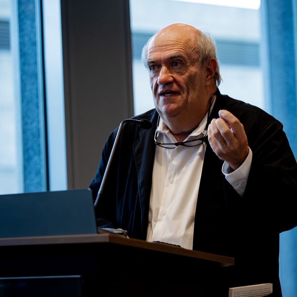 Colm Toibin speaking at a podium