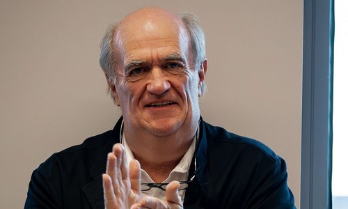 Colm Toibin clapping at an event