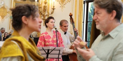 Singer Liv Monaghan performing in the Embassy