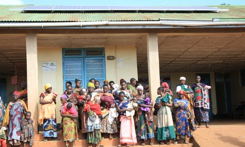 Mothers attending clinic services at Migongo Health Facility, which uses solar power to keep vital services running.