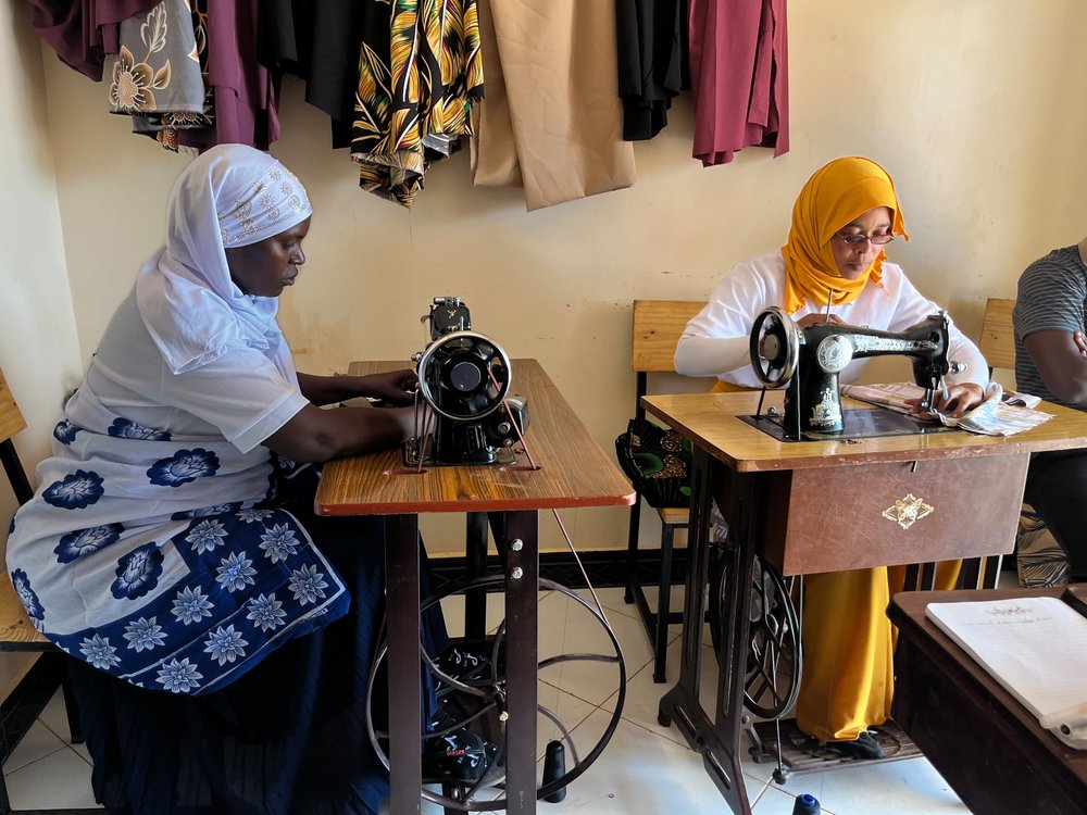 Tujikomboe Makamaka women’s group members Shadea and Madina in their tailoring office in Chemba District