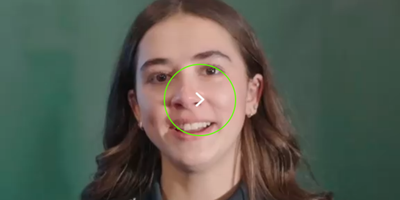 Headshot of Anabelle Zurbay with a play button overlay
