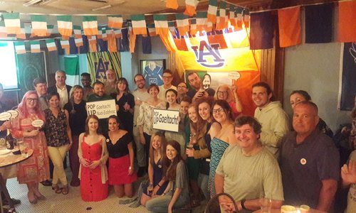 A group photo of people gathered for a pop up Gaeltacht in New York