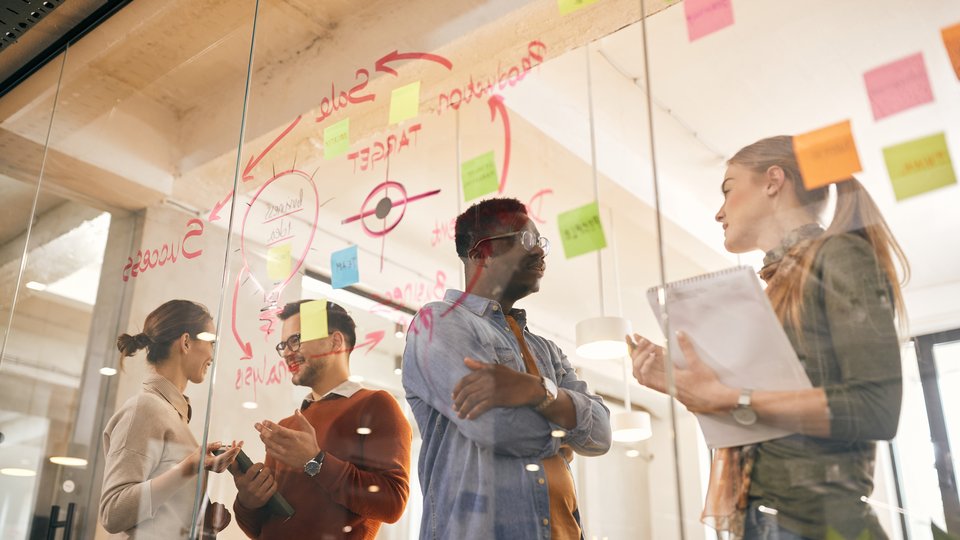 people at meeting having a brainstorm