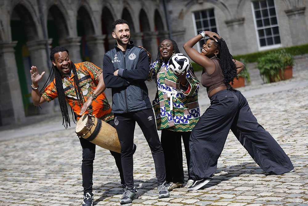 two men and two women striking poses in Kilmainham to promote Africa Day