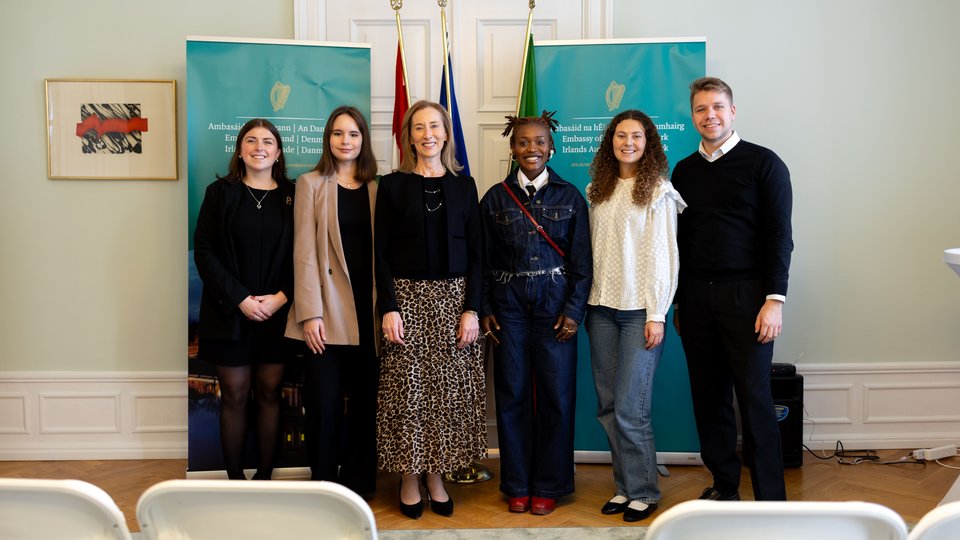 Group photo of panellists with Ambassador
