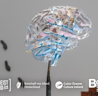 Glass sculpture of a brain design on flyer for book launch