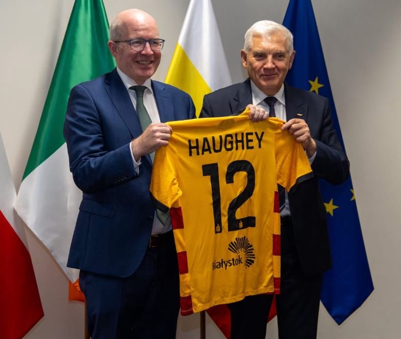 Ambassador Haughey receives a jersey from Mayor Truskolaski