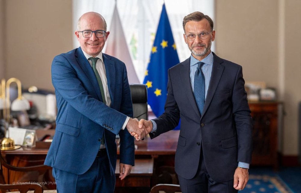 Ambassador Haughey and Voivode Brzozowski shake hands