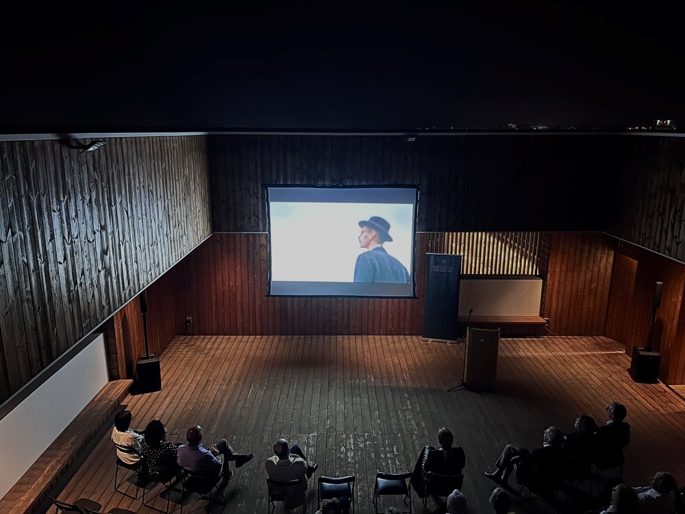 Screen showing James Joyce in silhouette.
