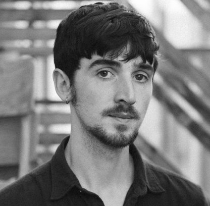 Headshot of Brían Mac Gloinn