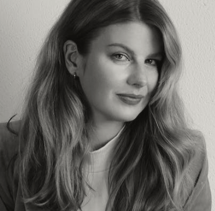 Woman with a yellow blazer on