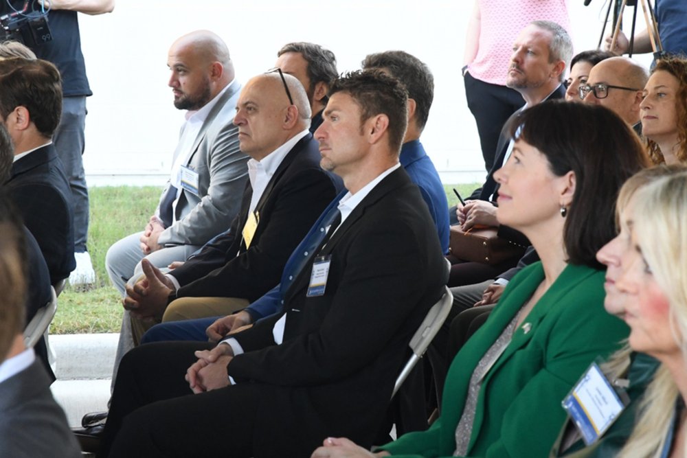 an audience of people in business attire