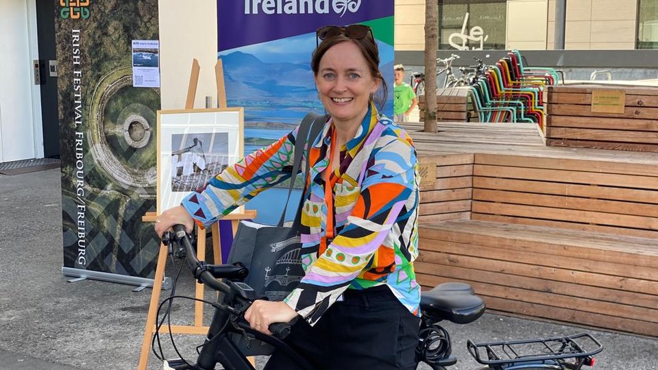 Clare O'Dea sitting on a bike