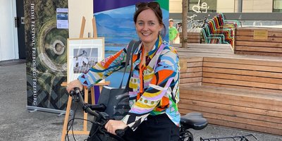 Clare O'Dea sitting on a bike