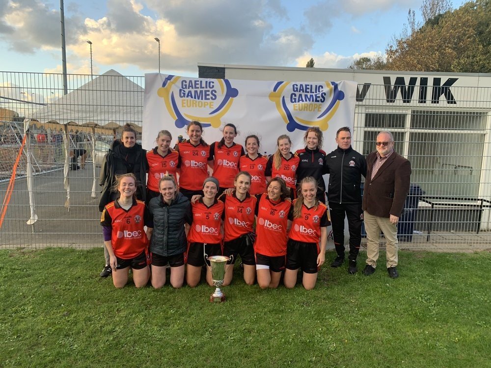 Craobh Rua women's team at the Gaelic Games Europe tournament with their trophy