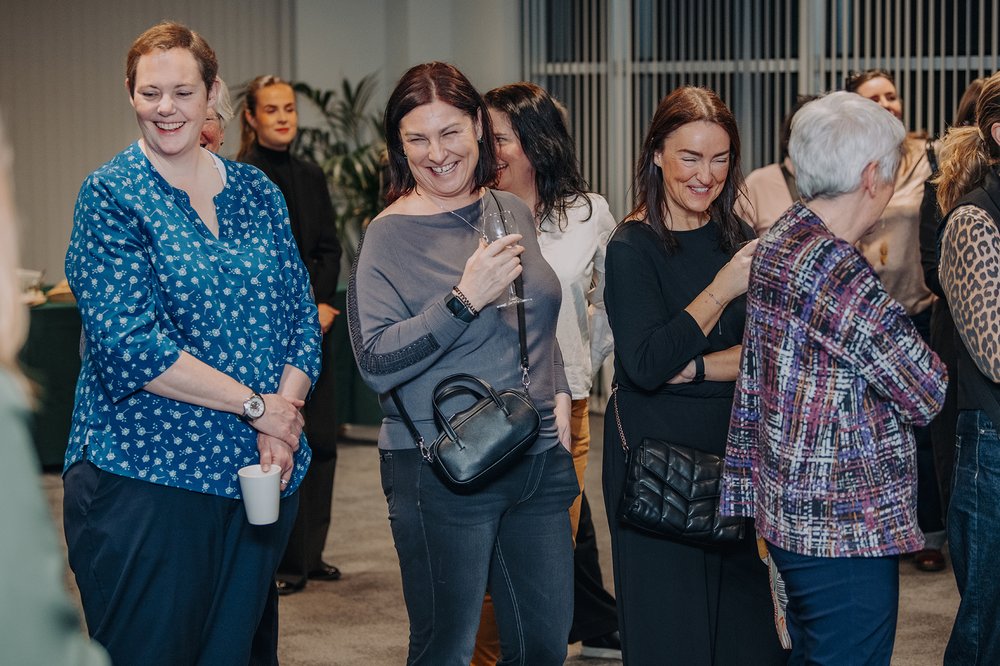Women in the audience chatting