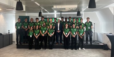 DCU Solar Racing team posing for a photo with Deputy Head of Mission David Walsh