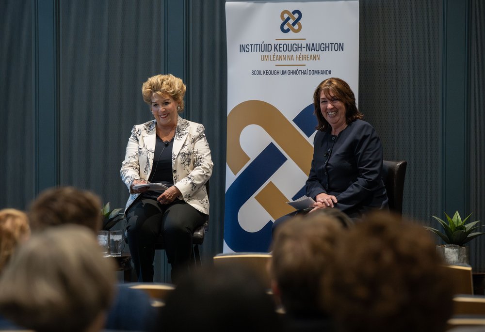 Ambassador Byrne Nason and Ambassador Cronin seated for Q&A at Notre Dame auditorium.