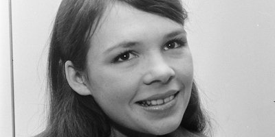 A black and white photograph of Irish singer Dana as a young woman
