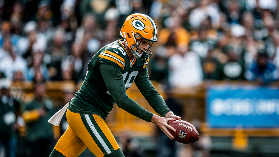 Daniel Whelan about to kick a football
