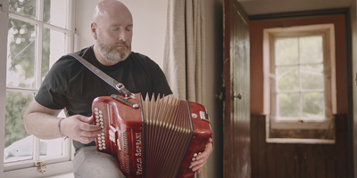 Man playing accordion