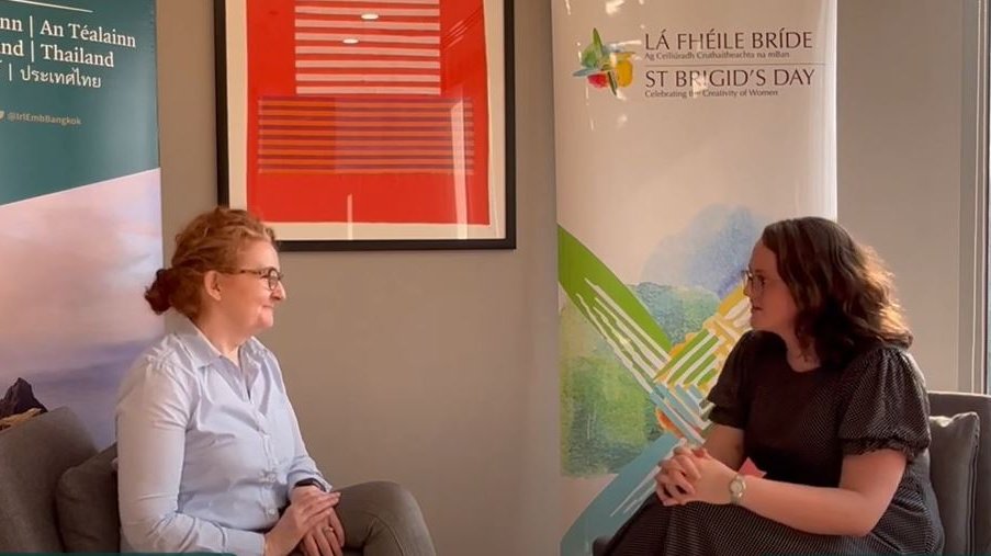 Dr Niamh Shaw speaking to a member of Embassy staff.
