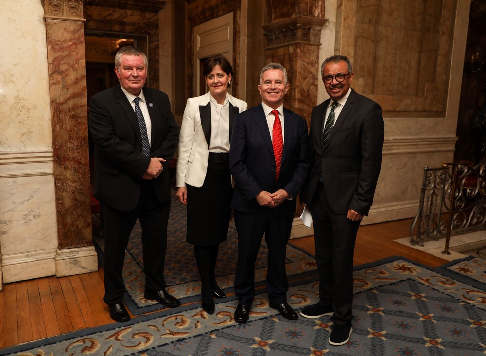 World Health Organisation leaders standing in Iveagh House with Minister Sean Fleming