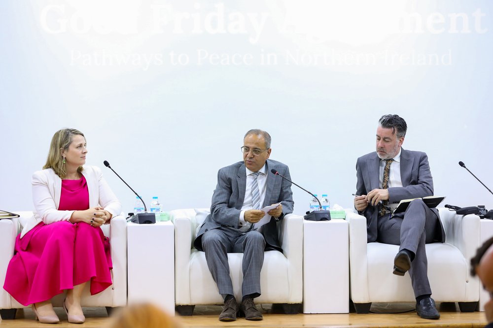 Three speakers on stage