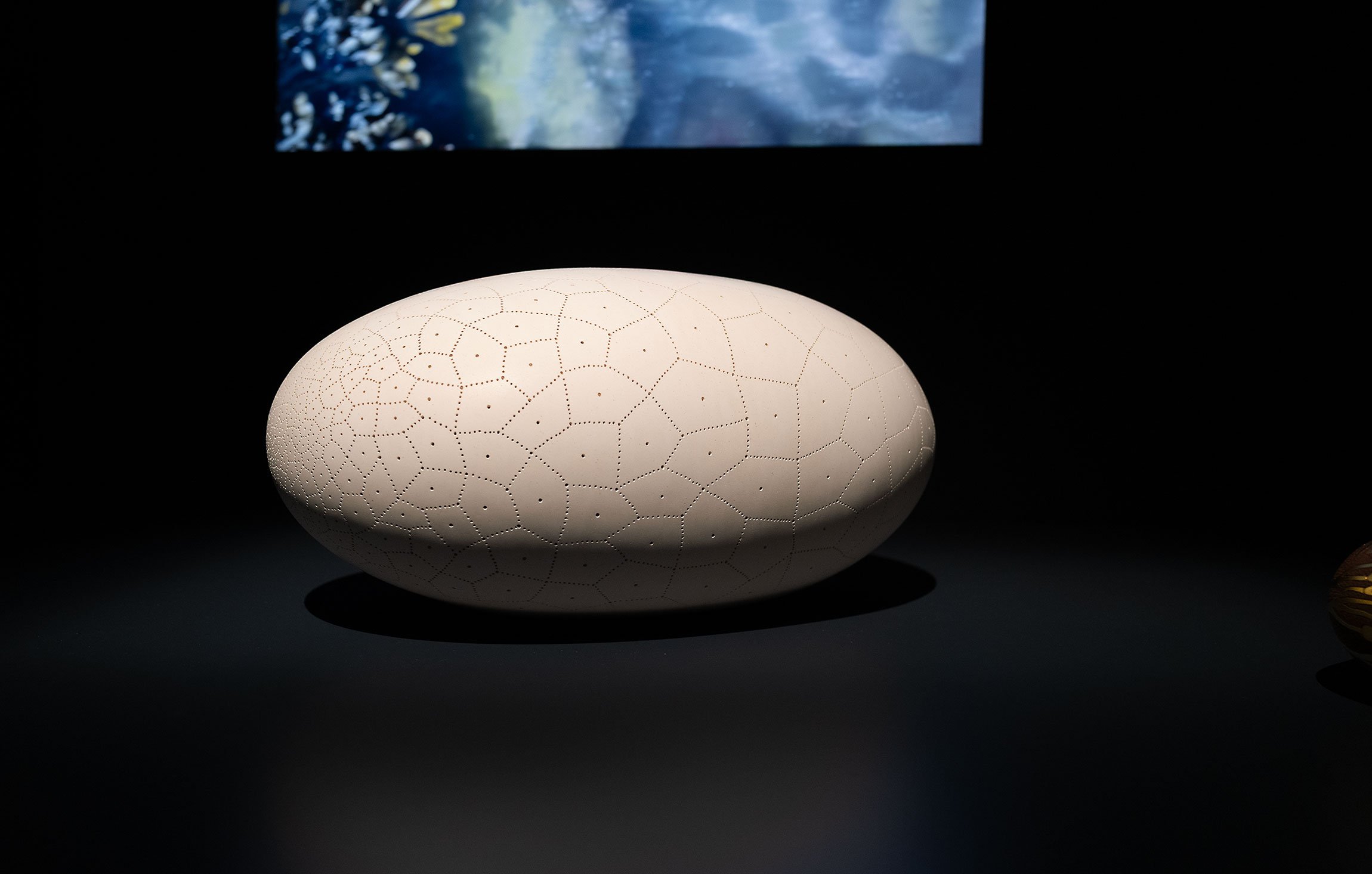 Egg shaped ceramic artwork