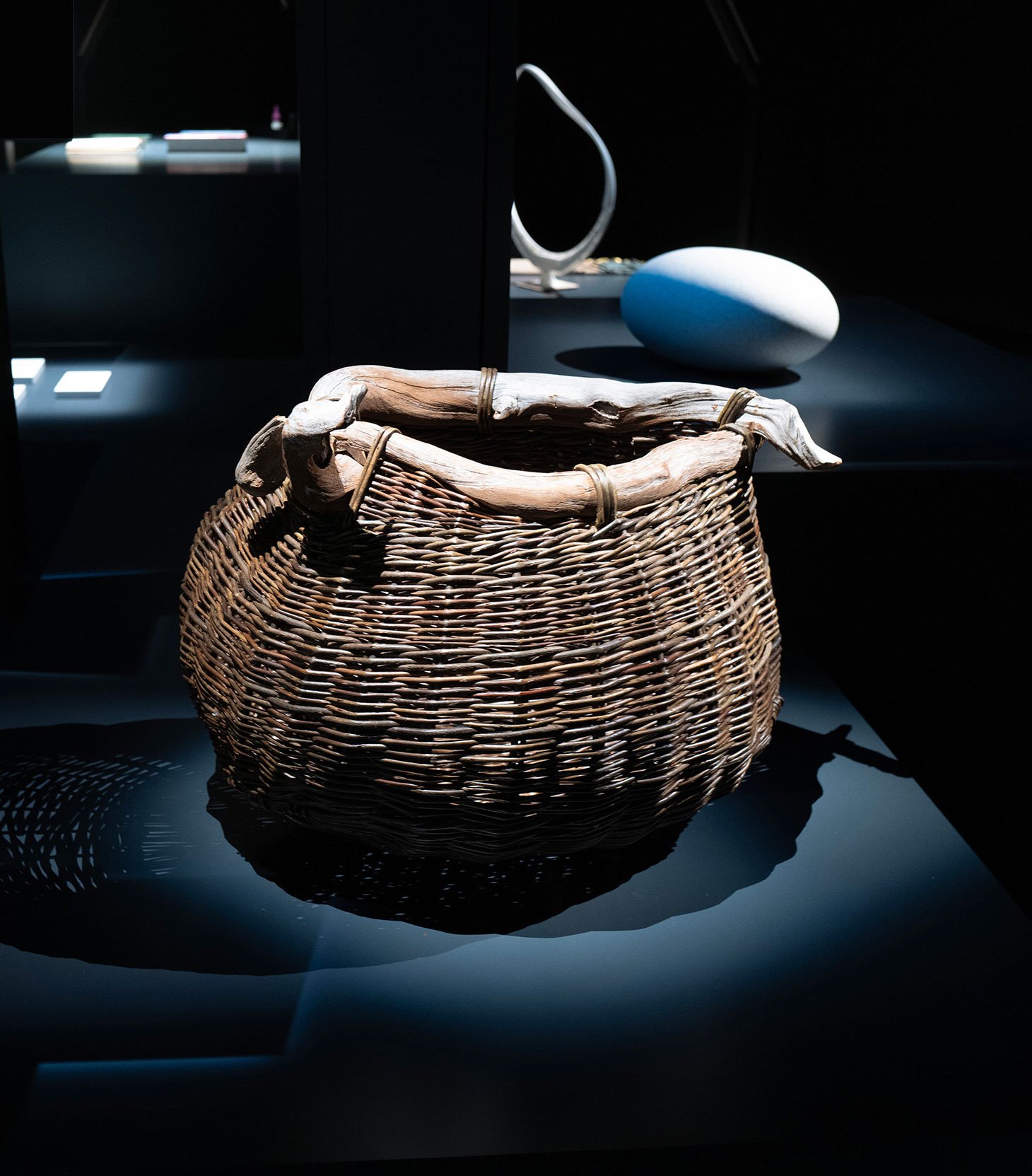 Woven basket on display in an exhibition