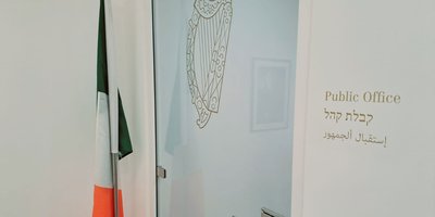 View of the entryway of the Embassy with the Irish flag.