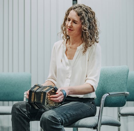 Woman playing the concertina