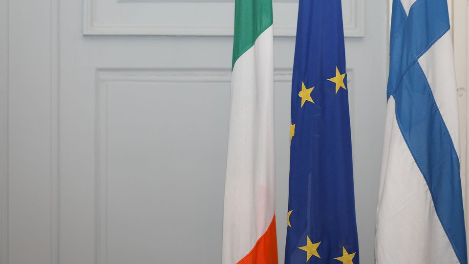 Irish, EU and Finnish flags together