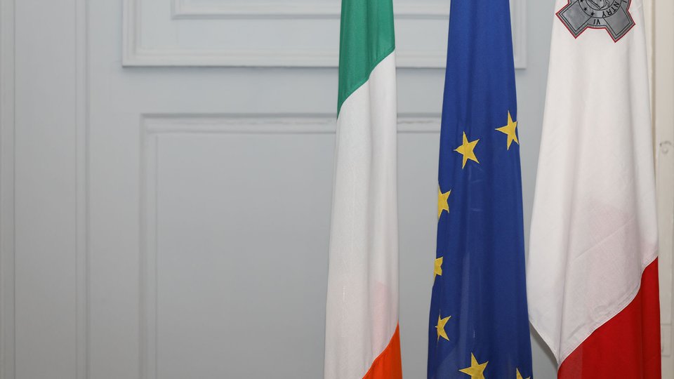 Irish, EU and Maltese flag