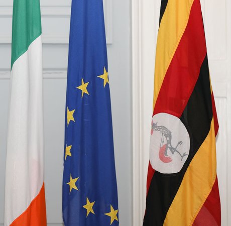 Irish, EU, and Uganda national flags